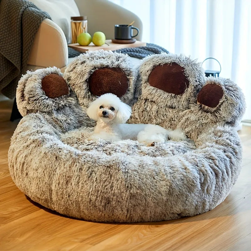 Cama para mascotas con forma de pata de oso